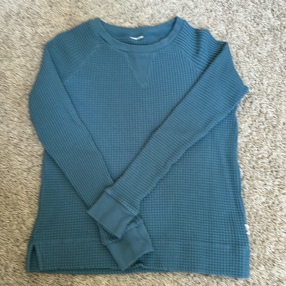 The North Face waffle knit, long sleeve light weight sweatshirt blue. Size XS.